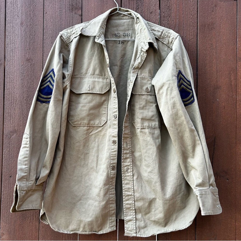 Beige military navy shirt with officer stripes.